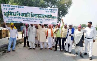 Farmers march against land acquisition